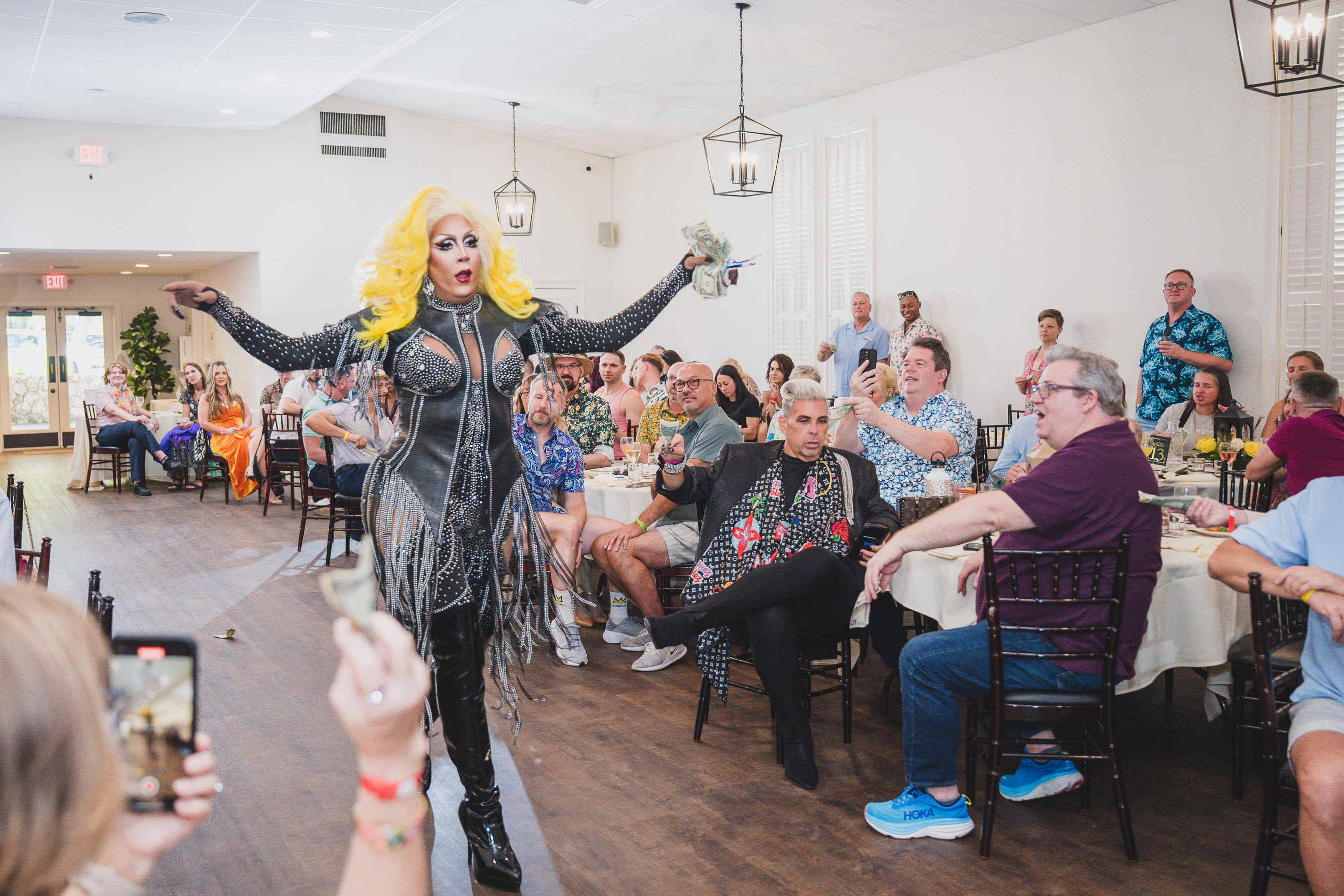 Drag queen performing at Peacocks & Divas 2025